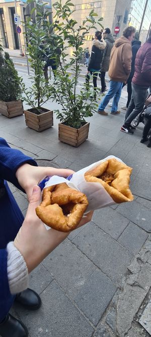 Left (scovergă with garlic sauce/mujkei). Right (scovergă with cooked cabbage) at Scovergi Mica in Bucharest