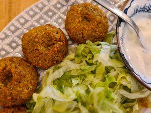 Falafel plate. Unfortunately on the right side there is sour cream, but we've notified owners, so hopefully they'll change it next time. at None Tonka in Omis