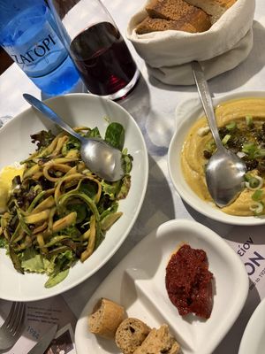 Delicious lemony salad (cheese on side) and fava bean puree  at Aktaion in Santorini