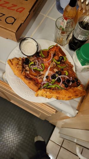 The vegan supreme + FYH ranch at University Pizza Company in Riverside
