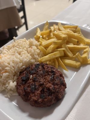 Beyond meat burger with fries and rice  at Lurdes Capela in Geres