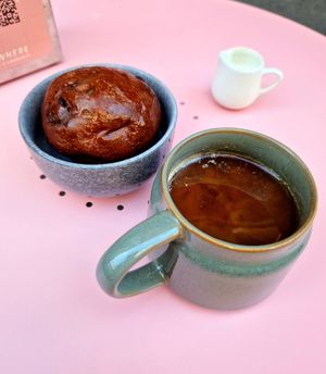 Caffè americano e brioche Black Panther 🌱 at Nowhere in Milan