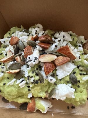 Avocado toast with vegan feta   at Nowhere in Milan