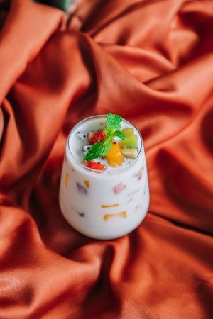 "Puffin" Soy Pudding - Traditional Thai style. Light, milky, a little minty and filled with seasonal fruits! at Kappra Cafe in Bangkok