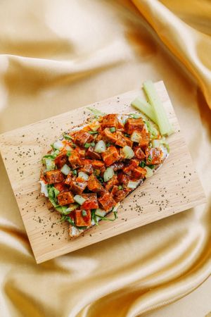 Buffalo "Ribs" - Mushroom-based protein coated in all that American goodness without any of the guilt! Celery, veggies and cream will mellow the acidity but not the fun  at Kappra Cafe in Bangkok