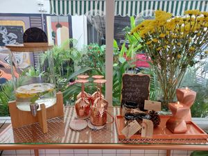Self serve water and granola for sale at Kappra Cafe in Bangkok