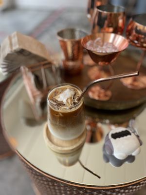 Iced coffee with coconut milk and fresh coconut  #Veganuary at Kappra Cafe in Bangkok