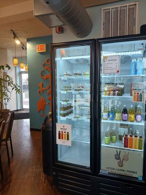 Fridge of raw desserts & drinks at Cacao Tree Cafe in Royal Oak