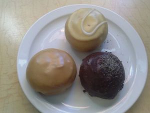 salted caramel, orangesicle, and chocolate cookie donuts at Pepples Donut Farm in Berkeley