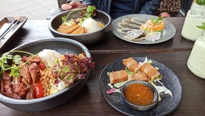 Curry with chicken,
Salmon-Avocado-tartar,
BBQ-Seitan,
"pork"-belly at Vegang in Berlin