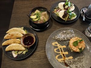 Dumplings, wonton soup, bao and salmon-avocado tartare at Vegang in Berlin