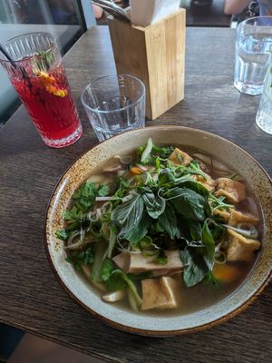 Pho with hibiscus tea in the background at Vegang in Berlin