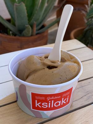 Vegan Cappuccino ice cream. Size medium (two scoops in the bowl). 
Unfortunately, they don’t offer vegan cones.   at Gelateria Ksilaki in Nikitas