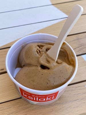 Vegan Cappuccino ice cream. Size medium (two scoops in the bowl). 
Unfortunately, they don’t offer vegan cones.   at Gelateria Ksilaki in Nikitas