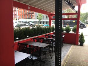 Outdoor seating (there is seating inside, too).  at Zazzy's Pizza - Upper East Side in New York City