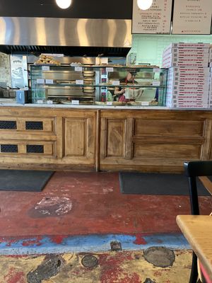 Nice inside with a/c and great music.  at Zazzy's Pizza - Upper East Side in New York City