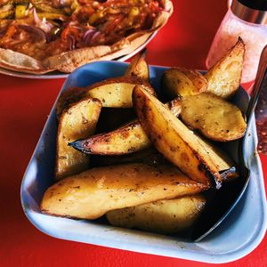 Potato wedges with garlic oil (very good potato!)  at The Blue Zone in Dingle