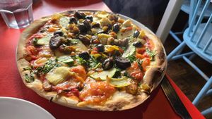Vegetarian pizza with vegan cheese at The Blue Zone in Dingle