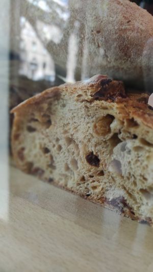 Fruit bread beyond burger at Fisheye in Rome