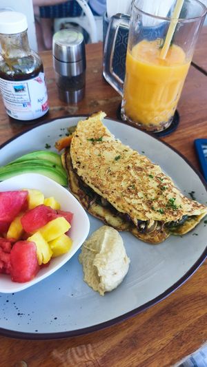 Vegan omelette and a papaya/mango juice at Noi Bistro in Tamarindo