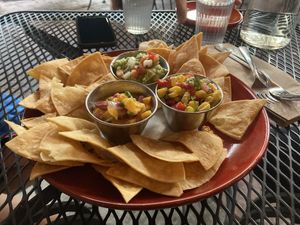 “Trio” chips and dip, with mango salsa, corn salsa, and guac   at Vegan Street in Calgary