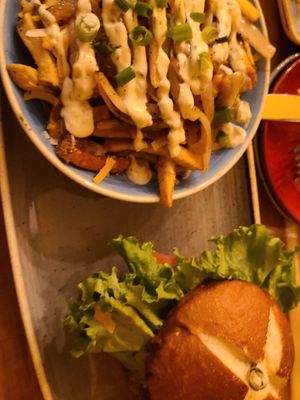 Bacun cheeze burger w/veggie patty and street fries at Vegan Street in Calgary