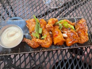 "skin-on" chick'n wings with chili sauce at Vegan Street in Calgary