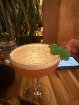 Dino-sour cocktail   at Vegan Street in Calgary