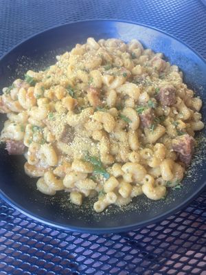 Mac and cheese with beyond sausage addition. A “nooch” forward Mac and cheese with a coconut cream base. Good but could be creamier, at Vegan Street in Calgary