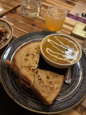 Pumpkin soup and grilled cheeze (fuzzy peach marg in the back)  at Vegan Street in Calgary