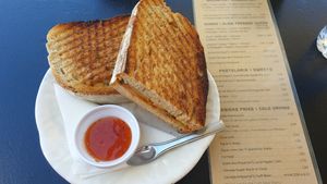 Eggplant, tomato and hummus toasted sandwich with sweet chilli sauce at XS Café in Prazeres