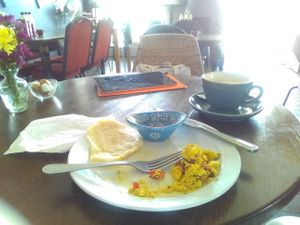 This is like real scrabbled egg.  I needed to stop eating to photograph the taste for you.  On real plates and cutlery now that Cumbia Kitchen is a café bar. at Cumbia Kitchen - Cafe Bar in St Leonards