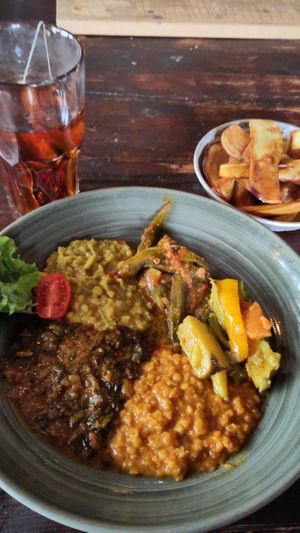Mixed veggie plate, potatoes as sides, tea with fresh cinnamon and cardamom at Ambiente Africa in Stuttgart
