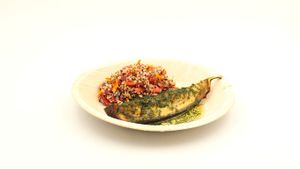 slow cooked eggplant, smoked oil and quinoa salad with edible flowers [vegan] at Heltie in Gavere