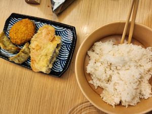 Some of the side dishes and rice at Kineya Mugimaru in North London