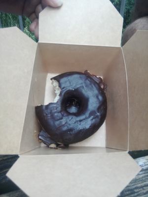 Chocolat donut and sneakers at The Sweet Vegan in Nuremberg