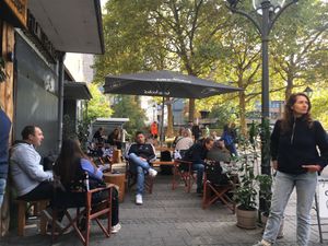 Pleasant seating in court outside venue at The Sweet Vegan in Nuremberg
