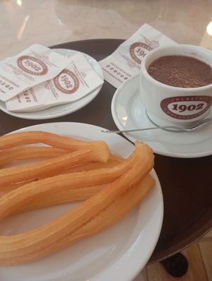 One serving of churros (4) and vegan chocolate. at Chocolateria 1902 in Madrid