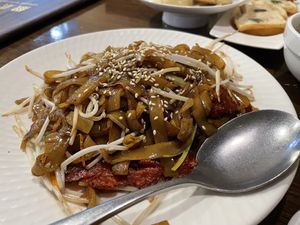 Stir-Fried Flat Rice Noodles with Veggie BBQ Pork  at Veggie Kingdom 緻素坊 in Kowloon