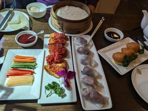 Crispy duck pancake; BBQ pork in rice noodle rolls; carrot salt water samosas at Veggie Kingdom 緻素坊 in Kowloon