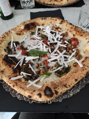 Vegan pizza with beyond meat, violife cheese and spinach at Isabella De Cham in Naples
