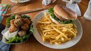 Broccoli and cauliflower bites and vegan burger with fries at Kaupfjelagid The Old General Store in Breiddalsvik