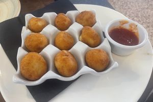 Croquetas de queso con mermelada de pimientos  at La Genuina in Nigran