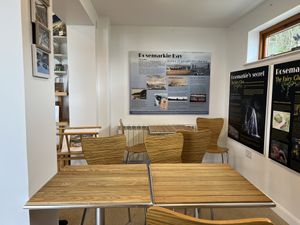 Some seating inside   at Rosemarkie Beach Cafe and Exhibition in Fortrose