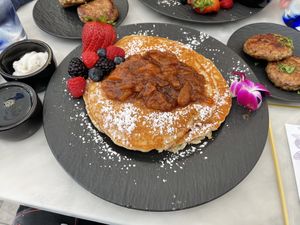 You can order the peach cobbler pancakes with vegan sausage or vegan bacon  at Gaia & Loki in Jersey City