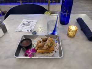 The Filipino Lumpia
Filipino spring roll. wrapped in rice paper, filled with seasoned plant base meat Served with sweet and spicy chili sauce.  at Gaia & Loki in Jersey City