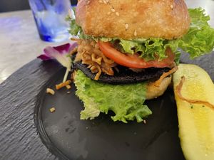 Shroom Burger
Crispy Korean fried or sautéed portobello mushroom topped with apple soy glaze and onion straws on a bed of lettuce and sriracha mayo  at Gaia & Loki in Jersey City