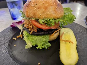 Shroom Burger
Crispy Korean fried or sautéed portobello mushroom topped with apple soy glaze and onion straws on a bed of lettuce and sriracha mayo  at Gaia & Loki in Jersey City