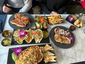 Eggplant parm with a side salad, butternut squash hero with fries, potato leek soup, pineapple fried rice and Loki tacos 😋😋😋  at Gaia & Loki in Jersey City