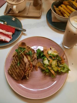 Cappuccino, red velvet cake, toastie, iced latte, salt and pepper fries at Organico Juice Bar & Eatery in Liverpool